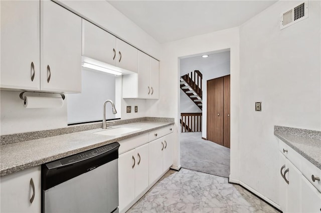 402 Forest Edge Ct, Mccandless, PA 15090 - kitchen with dishwashing machine, a sink, white cabinets, and light countertops