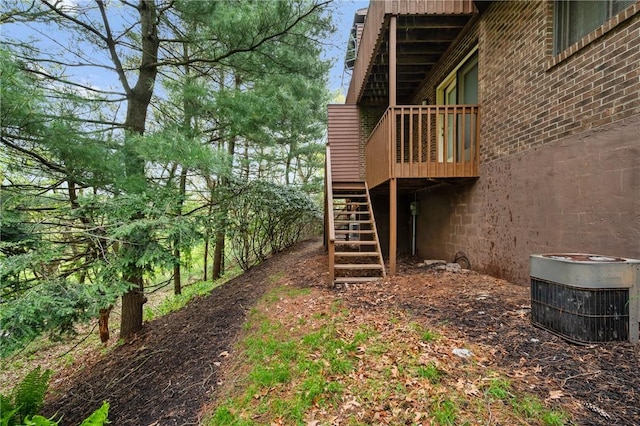402 Forest Edge Ct, Mccandless, PA 15090 - view of yard with stairway, central AC unit, and a wooden deck