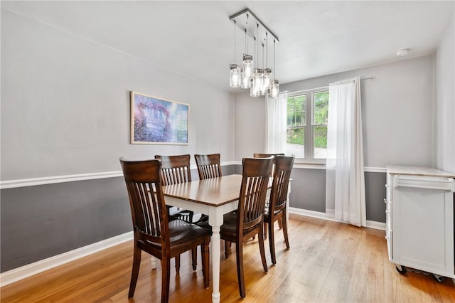 3234 Shadyway Dr, Brentwood, PA 15227 - dining space featuring light wood-type flooring, baseboards, and a chandelier