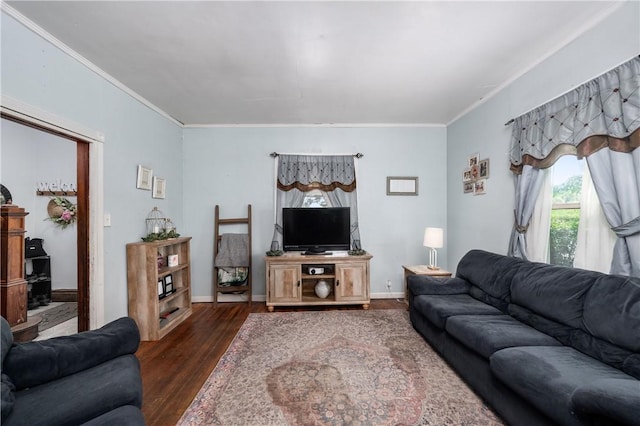 living room with ornamental molding, dark wood-style floors, and baseboards