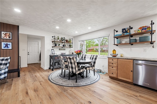 dining room featuring recessed lighting, light wood finished floors, and baseboards
