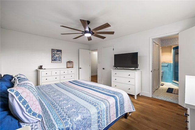 bedroom with wood finished floors, a ceiling fan, and baseboards