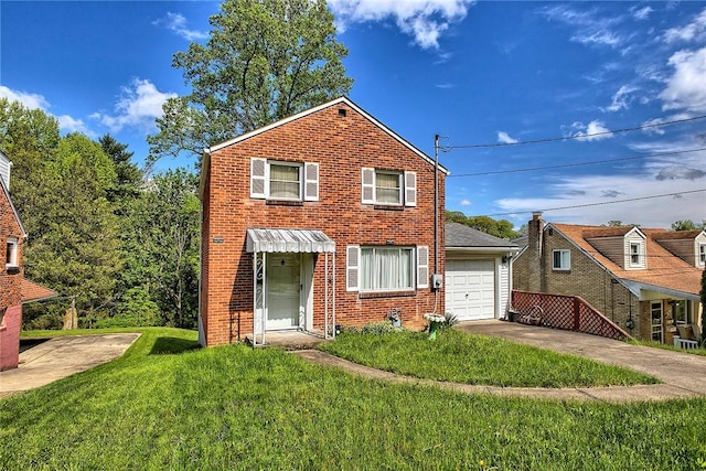 view of front of house with brick siding, a front yard, concrete driveway, and a garage
