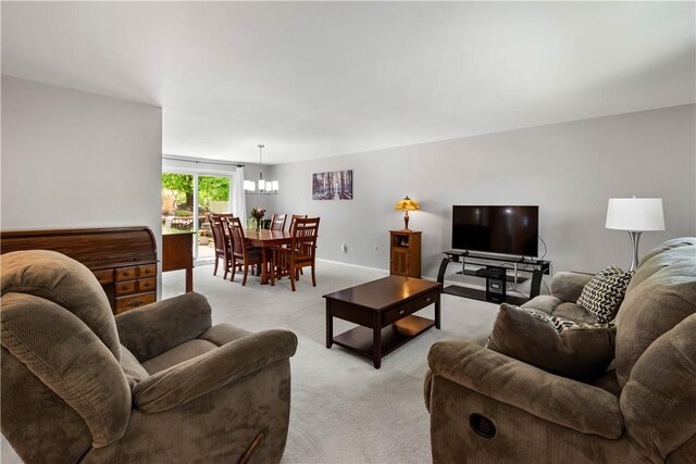 721 Brookshire Dr, Mccandless, PA 15237 - living area featuring light carpet and a chandelier