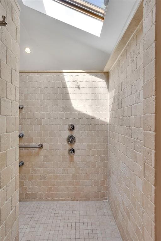 bathroom with tiled shower