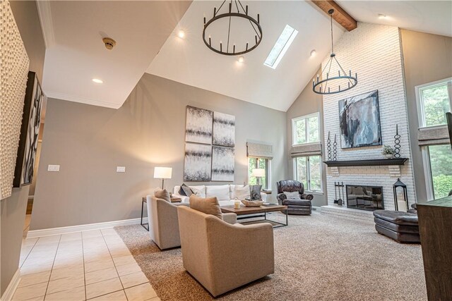 living area featuring high vaulted ceiling, beamed ceiling, baseboards, light tile patterned floors, and a brick fireplace