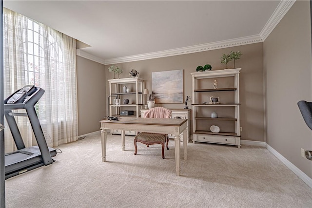 office area with light carpet, ornamental molding, and baseboards