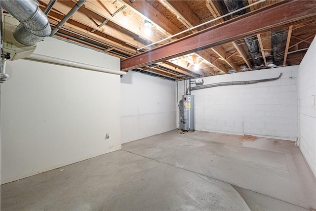 unfinished basement with gas water heater