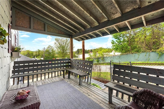 wooden deck featuring fence