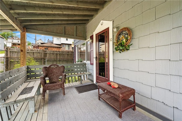 view of patio / terrace featuring fence