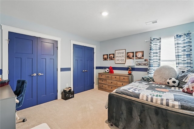 bedroom featuring carpet