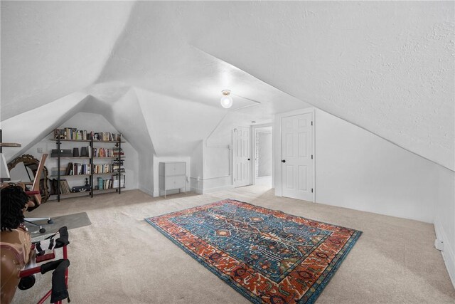 bonus room featuring carpet flooring and lofted ceiling