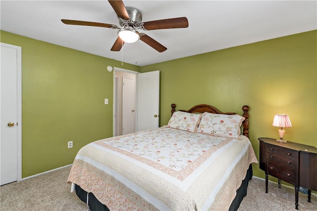 carpeted bedroom with baseboards and ceiling fan