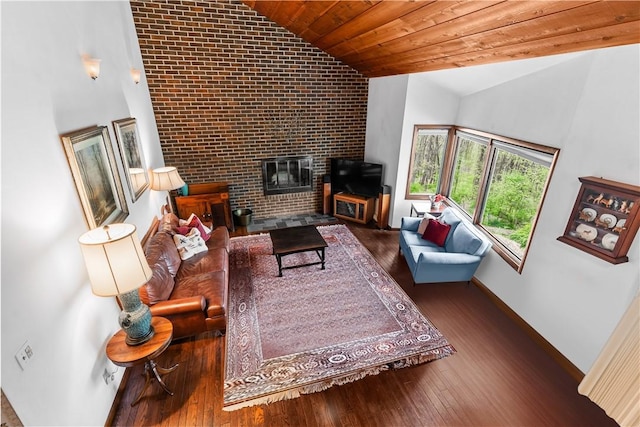 108 Crestview Dr, Evans City Boro, PA 16033 - living area featuring wood finished floors, high vaulted ceiling, baseboards, wooden ceiling, and a fireplace