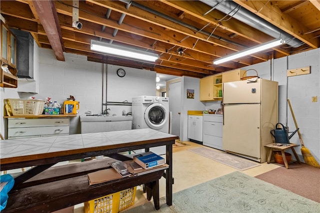 108 Crestview Dr, Evans City Boro, PA 16033 - laundry area featuring washing machine and dryer and concrete block wall