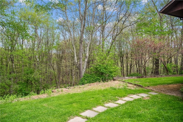 108 Crestview Dr, Evans City Boro, PA 16033 - view of green lawn with a wooded view