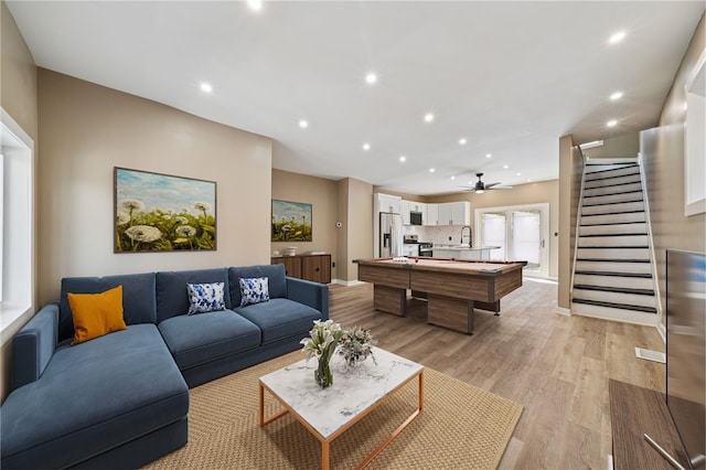 232 57th St, Lawrenceville, PA 15201 - living room with stairway, light wood-style floors, recessed lighting, pool table, and ceiling fan