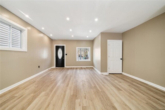 232 57th St, Lawrenceville, PA 15201 - entrance foyer with baseboards, light wood-type flooring, and recessed lighting