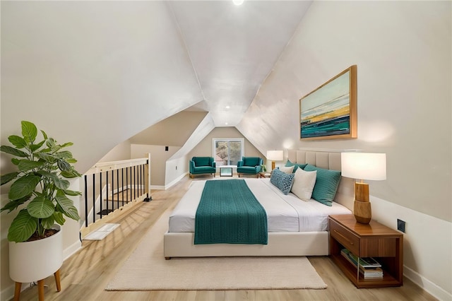 232 57th St, Lawrenceville, PA 15201 - bedroom featuring baseboards, wood finished floors, and vaulted ceiling