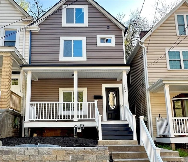 232 57th St, Lawrenceville, PA 15201 - view of front facade with a porch