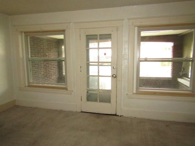 doorway with baseboards