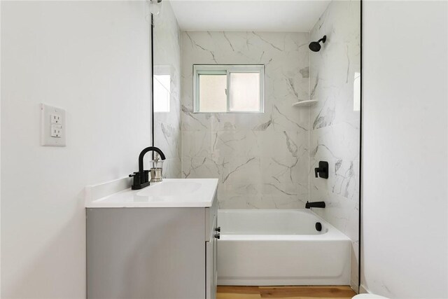bathroom with vanity and shower / bath combination