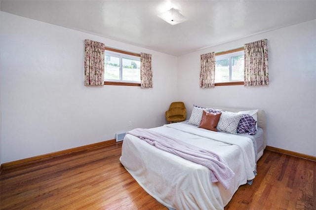 1104 Bennett Ave, Jeannette, PA 15644 - bedroom featuring baseboards and wood finished floors