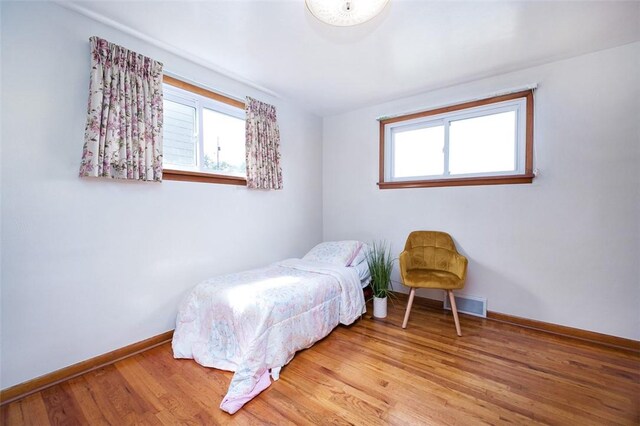 1104 Bennett Ave, Jeannette, PA 15644 - bedroom featuring wood finished floors and baseboards