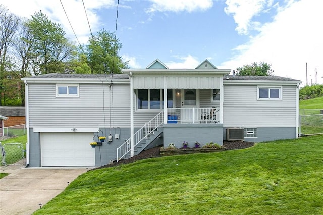 1104 Bennett Ave, Jeannette, PA 15644 - view of front of property with a porch, a garage, cooling unit, concrete driveway, and stairway