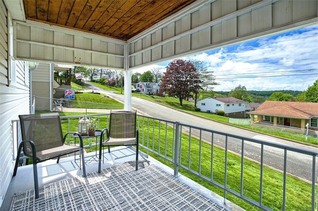1104 Bennett Ave, Jeannette, PA 15644 - balcony with covered porch and a residential view