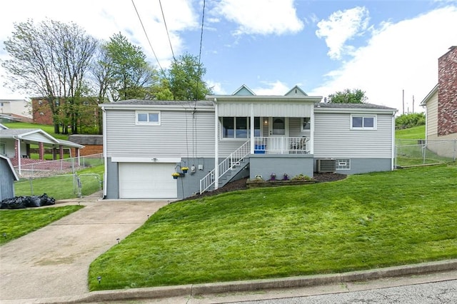 1104 Bennett Ave, Jeannette, PA 15644 - view of front of property with a porch, an attached garage, driveway, cooling unit, and stairs
