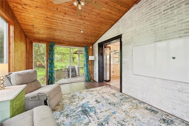 sunroom / solarium with vaulted ceiling and ceiling fan