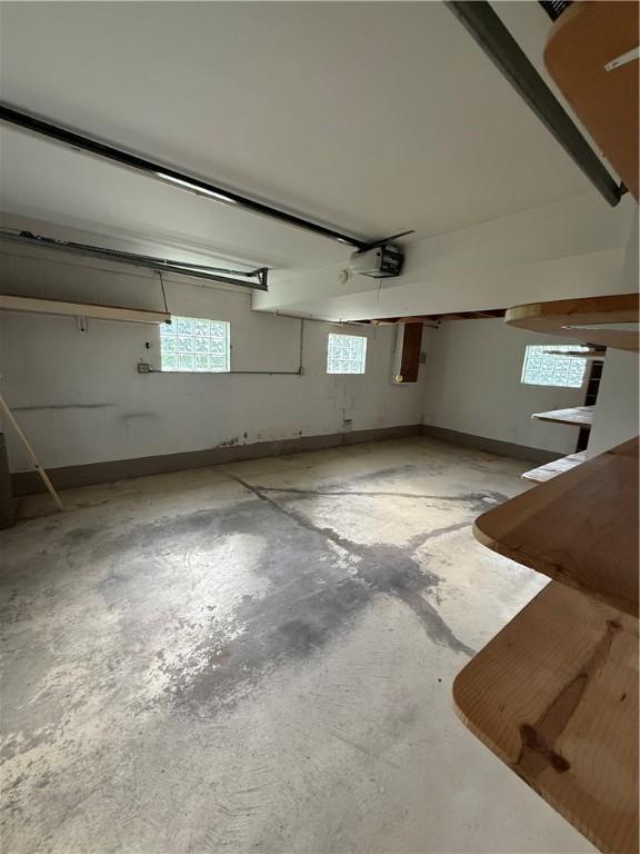 below grade area with a garage and healthy amount of natural light
