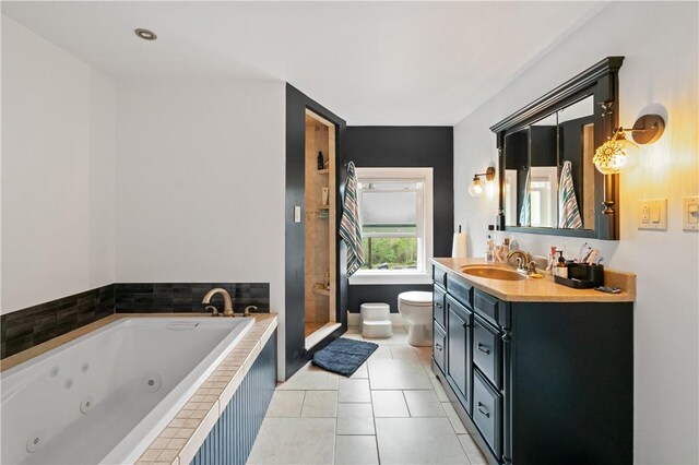 534 Freeport Rd, South Buffalo Twp, PA 16229 - bathroom with toilet, a shower stall, vanity, a jetted tub, and tile patterned floors