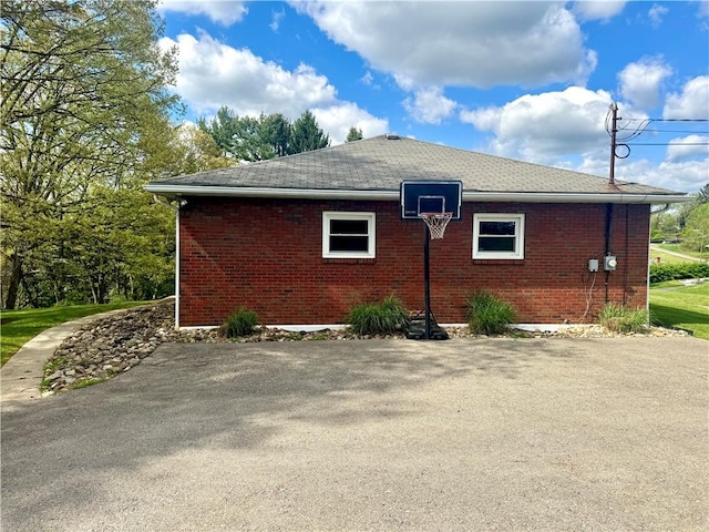 112 Dolphin Dr, Twp Of But Se, PA 16002 - view of home's exterior with brick siding and a shingled roof