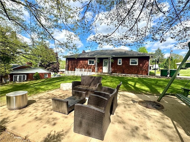 112 Dolphin Dr, Twp Of But Se, PA 16002 - rear view of house with a patio, a yard, and brick siding