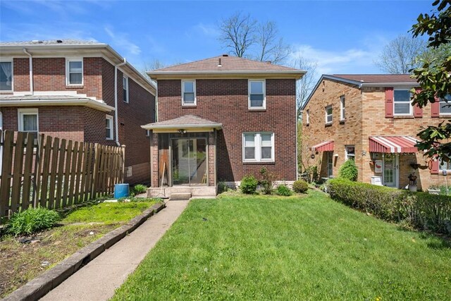 7208 Raymond St, Swissvale, PA 15218 - rear view of property featuring brick siding