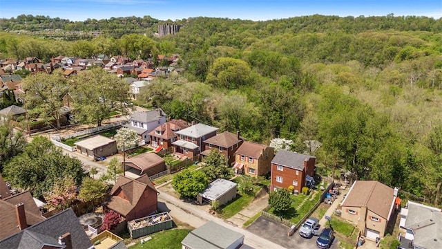 7208 Raymond St, Swissvale, PA 15218 - aerial perspective of suburban area featuring a heavily wooded area