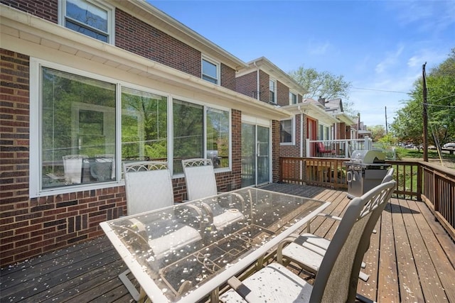 7208 Raymond St, Swissvale, PA 15218 - wooden terrace with outdoor dining space and a grill
