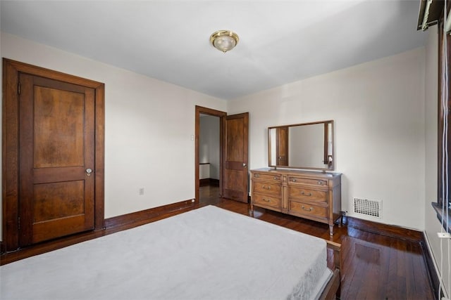 7208 Raymond St, Swissvale, PA 15218 - bedroom with dark wood-style floors and baseboards