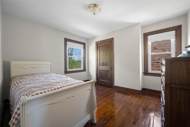 7208 Raymond St, Swissvale, PA 15218 - bedroom featuring baseboards and dark wood finished floors