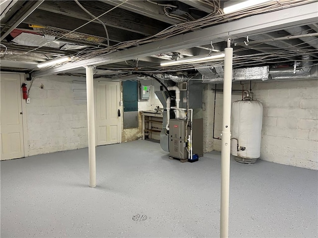 7208 Raymond St, Swissvale, PA 15218 - unfinished below grade area featuring water heater and heating unit