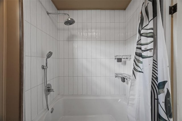 bathroom with shower / bathtub combination with curtain