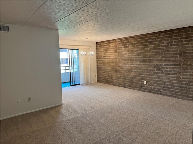 227 S Home Ave Unit 307, Avalon, PA 15202 - unfurnished room with a chandelier, brick wall, carpet, and baseboards