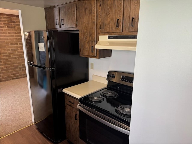 227 S Home Ave Unit 307, Avalon, PA 15202 - kitchen featuring range hood, stainless steel range with electric stovetop, freestanding refrigerator, light countertops, and brick wall