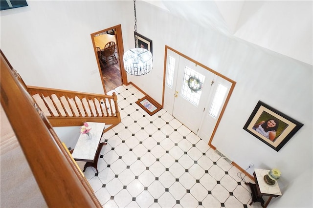 106 Arbor Trl, Slippery Rock Boro, PA 16057 - entryway with tile patterned floors, baseboards, and stairs
