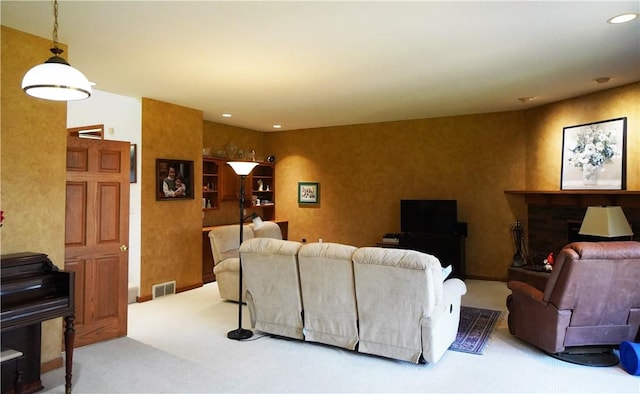 106 Arbor Trl, Slippery Rock Boro, PA 16057 - living room featuring carpet flooring, recessed lighting, and a fireplace