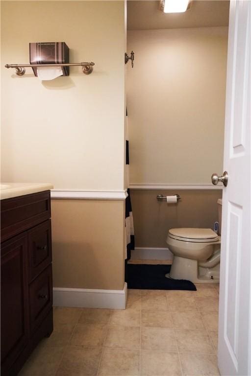 106 Arbor Trl, Slippery Rock Boro, PA 16057 - bathroom with toilet, vanity, baseboards, and tile patterned floors