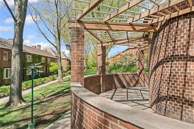 view of patio featuring a pergola