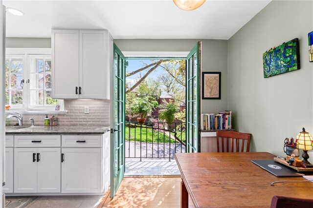 dining area featuring light tile patterned floors
